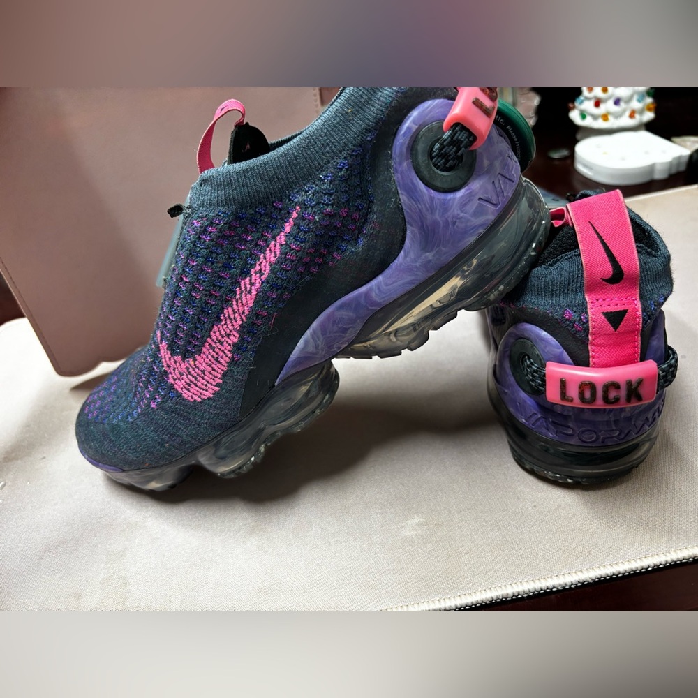 Nike Flyknit Sneakers with Pink and Purple Accents